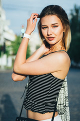 Beautiful and gorgeus blonde girl walking in an urban contest, srong personaliies and self esteem...