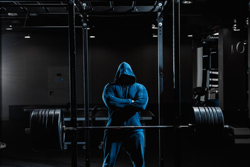 Strong man working in gym