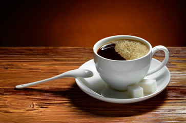 Coffee cup and saucer on a wooden table