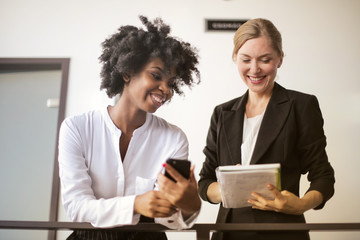 Female co-workers talking.