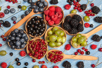 Various fresh summer berries. Top view. Berries mix fruit color food dessert.Berries.Antioxidants,...