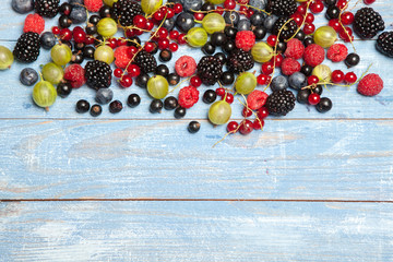 Various fresh summer berries. Top view. Berries mix fruit color food dessert.Berries.Antioxidants,...