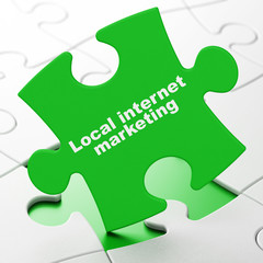 Marketing concept: Local Internet Marketing on Green puzzle pieces background, 3D rendering