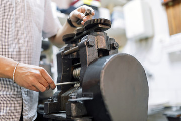 Goldsmith crafting metal