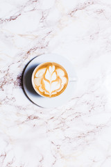 cup coffee on wood table in top view