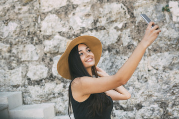 Beautiful girl taking a selfie