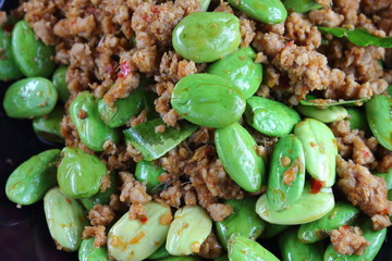 fried pork with stink bean food in thailand