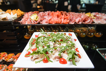 Salad with rucola and tomatoes.Selective focus