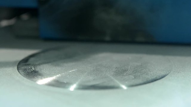 Timelapse, fast video. 3D printer printing metal. Laser sintering machine for metal. Metal is sintered under action of laser into desired shape. Progressive modern DMLS, SLM, SLS additive technology