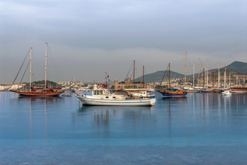 Fototapeta premium Bodrum, Turkey, 30 May 2010: Sailboats and Bodrum Castle