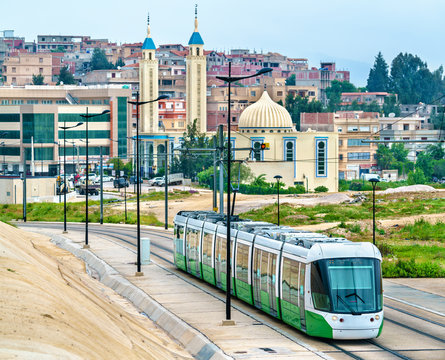 City tram and a mosque in Constantine, Algeria
