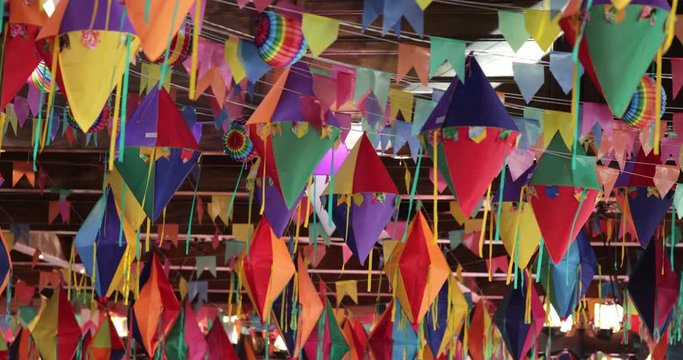 Flags, balloons, ribbons hanging from the ceiling. typical decoration8