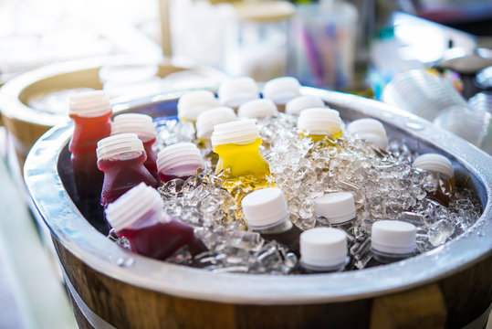 Cool fruit juice in a wooden bucket.