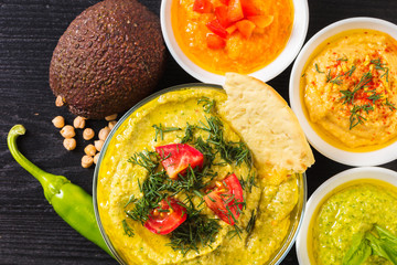 assorted hummus with vegetables