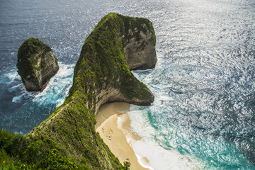 Top view of famous Kelingking Beach located at Nusa Penida Island, Bali, Indonesia. Rock in the...