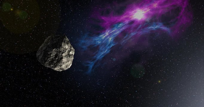 An asteroid tumbles slowly at it travels through empty space. Lens fx, nebulae. Reversible, can be rotated 180 degrees. Elements of this image furnished by NASA.