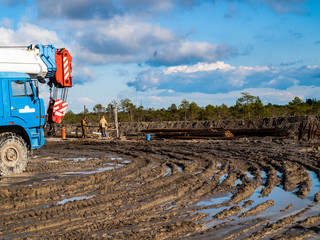 construction site after a rain and the crane