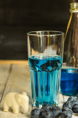lemonade blue colors with blueberry Close up - drink berry taste. food background. drink background