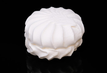 White marshmallow on a black background