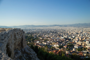 Obraz premium Ruin of a Temple at the Acropolis with Athens Backdrop, Greece