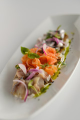 Fish mix with vegetables. Cold appetizer