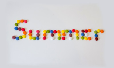 Summer word written with colorful candies