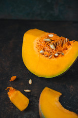 Pumpkin on wooden tray with rustic background