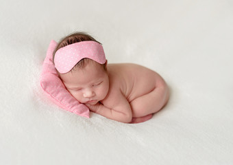 sleeping newborn baby girl