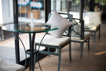 glass table in the empty cafe in the morning waiting for the first customer.