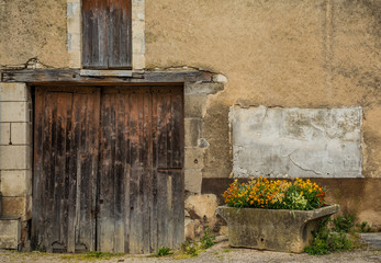 Planter and flowers in the beautiful town of Chablis, Burgundy, France
