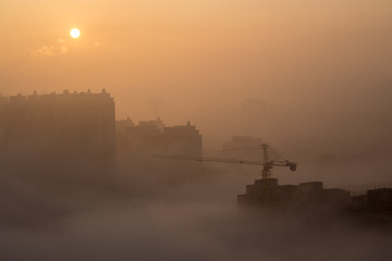 Misty morning loaded with air pollution in a Chinese city