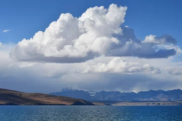 Fotobehang China, Tibet, the clouds are reflected in holy lake Manasarovar © irinabal18