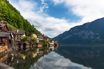 Fototapeta na wymiar Scenic postcard view of the famous Hallstatt in the Austrian Alps in the summer morning, Salzkammergut district, Austria. View from the south