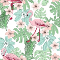 Tropical seamless vector pattern with flamingo and flowers.