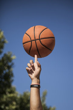Afro young brothers play basketball