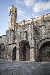 Fototapeta na wymiar Gothic quarter, square with medieval walls of Barcelona.