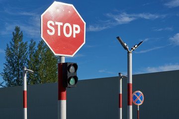 CCTV camera on the stop sign and traffic lights.