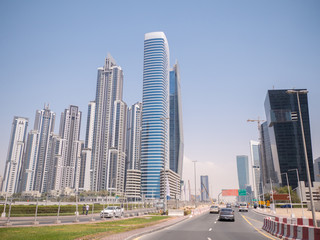 Modern buildings and street in Dubai on a clear day