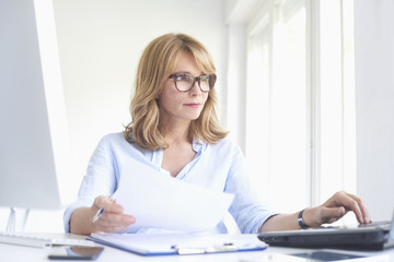 Professional woman working at the office