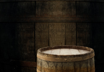 background of barrel and worn old table of wood