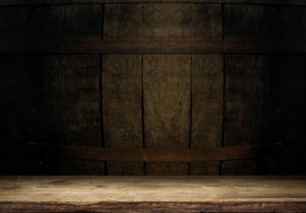 background of barrel and worn old table of wood