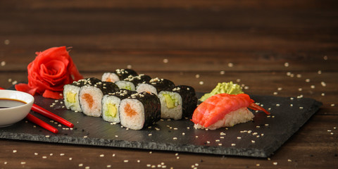 sushi rolls and sushi maki (a portion of sushi) - Sushi menu. Japanese food. food background © Alesia Berlezova
