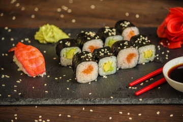 sushi rolls and sushi maki (a portion of sushi) - Sushi menu. Japanese food. food background