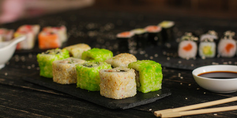 sushi rolls and sushi maki (a portion of sushi) - Sushi menu. Japanese food. food background