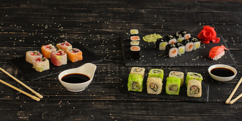 sushi rolls and sushi maki (a portion of sushi) - Sushi menu. Japanese food. food background