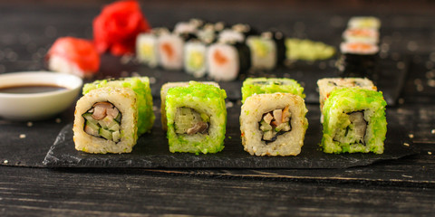 sushi rolls and sushi maki (a portion of sushi) - Sushi menu. Japanese food. food background
