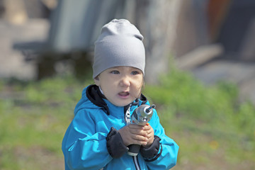 little boy with a construction tool in his hands