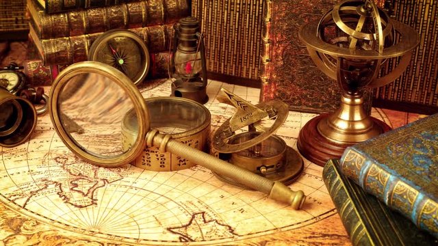 Vintage still life on an old map in 1565.