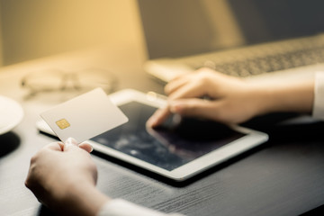 Business Woman use Credit Card to  Shopping Online with Computer Laptop and tablet