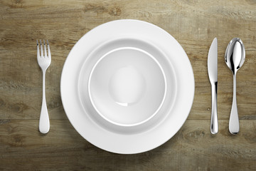 clean dinner ware on wooden table
